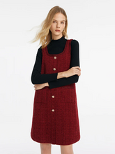 a lady in black slim sweater and red tweed vest mini dress
